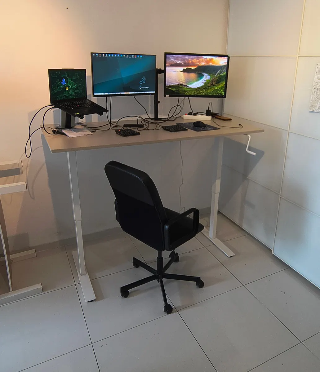 Height-adjustable standing desk workspace